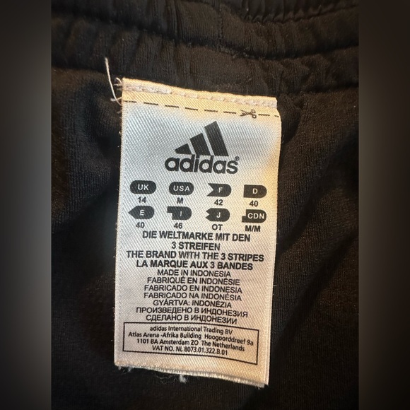 Adidas women’s medium running shorts. Black with 3 stripe in blue. EUC - Picture 3 of 7